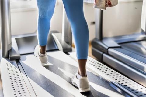 woman walking on treadmill